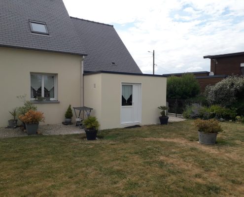 Extension de garage toit plat en béton